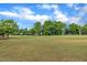 Community golf course offering mature trees, scenic views, and open green space at 1933 Castle Pines Dr, Raleigh, NC 27604