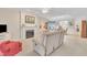 Comfortable living room with fireplace and view into the dining area at 1933 Castle Pines Dr, Raleigh, NC 27604