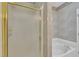 Bathroom featuring a soaking tub, shower with glass door, and patterned wallpaper at 1933 Castle Pines Dr, Raleigh, NC 27604