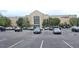 Exterior shot of parking lot in front of Macy's at a shopping center with available parking spaces at 1933 Castle Pines Dr, Raleigh, NC 27604