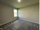 Bright bedroom featuring neutral walls and flooring, offering a peaceful retreat for relaxation at 199 Lotus Ave, Smithfield, NC 27577