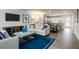 Spacious living room with plush seating and open layout into the kitchen at 201 Tormore Dr, Sanford, NC 27330