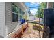 Spacious backyard area with hammock, and partially shaded by mature trees at 208 Station Dr, Morrisville, NC 27560