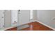 Welcoming entryway featuring hardwood floors, white trim, and a bright front door at 208 Station Dr, Morrisville, NC 27560