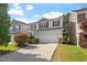 Charming two-story home with a two-car garage and well-maintained landscaping at 208 Station Dr, Morrisville, NC 27560
