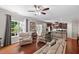 Spacious living room open to kitchen with hardwood floors and lots of natural light at 208 Station Dr, Morrisville, NC 27560