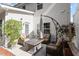 Cozy patio area featuring comfortable seating, a fire pit table, and an umbrella for shade at 208 Station Dr, Morrisville, NC 27560
