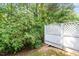 The backyard features lush greenery that provides an ideal amount of shade at 2089 White Pond Ct, Apex, NC 27523