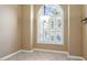 Bright dining room features a large window with shutters and decorative chandelier at 2089 White Pond Ct, Apex, NC 27523