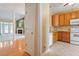 This open concept kitchen has stainless appliances and opens up to the living room at 2089 White Pond Ct, Apex, NC 27523