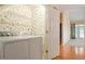 Laundry room featuring a washer, dryer, and wire shelving at 2089 White Pond Ct, Apex, NC 27523