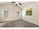 Bright bedroom features neutral walls, carpet flooring, and multiple windows for natural light at 230 Forest Meadow Ln, Franklinton, NC 27525