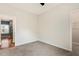 An empty bedroom with carpeted floors and a walk-in closet at 230 Forest Meadow Ln, Franklinton, NC 27525