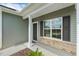 Cozy front porch entrance with stone accents, offering a warm welcome to visitors at 230 Forest Meadow Ln, Franklinton, NC 27525