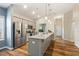 Bright kitchen with stainless steel appliances, granite countertops, and modern cabinets at 230 Forest Meadow Ln, Franklinton, NC 27525