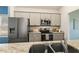 Kitchen with stainless steel appliances, granite countertops, and modern finishes at 230 Forest Meadow Ln, Franklinton, NC 27525