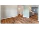 Spacious room features hardwood flooring and flows into other living areas of the house at 230 Forest Meadow Ln, Franklinton, NC 27525