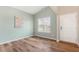 Inviting room with natural light, hardwood floors, and a calming, neutral color scheme at 230 Forest Meadow Ln, Franklinton, NC 27525