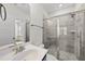 Modern bathroom featuring a glass-enclosed shower, stylish fixtures, and neutral color palette for a clean aesthetic at 2407 Miriam Cir, Durham, NC 27704