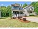 Charming two-story home with a welcoming front porch and well-maintained landscaping at 2407 Miriam Cir, Durham, NC 27704