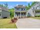 Charming two-story home with a welcoming front porch and well-maintained landscaping at 2407 Miriam Cir, Durham, NC 27704