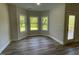 Cozy breakfast nook filled with natural light from three large windows at 253 Busterfield Ct, Benson, NC 27504