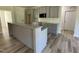Well-equipped kitchen with an island and granite countertops at 253 Busterfield Ct, Benson, NC 27504