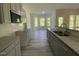 Well-lit kitchen featuring stainless appliances and an eat-in area at 253 Busterfield Ct, Benson, NC 27504