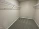 Walk-in closet with carpet and wire shelving for organized storage solutions at 253 Lotus Ave, Smithfield, NC 27577