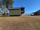 Backyard of property with shed and house in background at 302 N 12Th St, Erwin, NC 28339