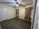 Bedroom with laminate wood flooring, overhead ceiling fan and closet at 302 N 12Th St, Erwin, NC 28339