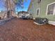 Side view of home with covered parking and storage at 302 N 12Th St, Erwin, NC 28339