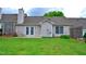 Expansive backyard with a well-manicured lawn and patio, perfect for outdoor entertaining at 3027 Maple Ave # Apt K3, Burlington, NC 27215