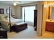 Bedroom features a large window with natural light and a view into the attached bathroom at 3027 Maple Ave # Apt K3, Burlington, NC 27215