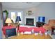 Cozy living room featuring a fireplace and natural light from the French doors at 3027 Maple Ave # Apt K3, Burlington, NC 27215