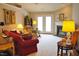 Inviting living room with fireplace, French doors, and neutral walls at 3027 Maple Ave # Apt K3, Burlington, NC 27215
