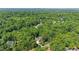 Serene aerial view of a home nestled amongst trees at 304 Villa Dr, Durham, NC 27712