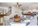 Open-concept living room featuring hardwood floors and recessed lights at 304 Villa Dr, Durham, NC 27712