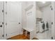 Convenient mudroom entry area with built-in bench, storage, and access to a laundry room at 304 Villa Dr, Durham, NC 27712