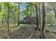 Dome home among trees, featuring unique architecture and surrounded by lush forest at 3312 Hawk Ridge Rd, Chapel Hill, NC 27516