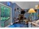 Bright living area with unique decor, stone fireplace, and a view of the outdoors at 3312 Hawk Ridge Rd, Chapel Hill, NC 27516