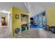 Open living room with fireplace, closet, and stairs, offering a bright and airy space at 3312 Hawk Ridge Rd, Chapel Hill, NC 27516