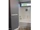 Clean bathroom with a bathtub and shower, featuring a window and modern shower fixtures at 3609 Cold Harbour Dr, Raleigh, NC 27610