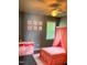 Cozy bedroom with a pink canopy bed, fun decorations, and a bright window at 3609 Cold Harbour Dr, Raleigh, NC 27610