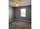 Bedroom with a ceiling fan, window and carpet at 3609 Cold Harbour Dr, Raleigh, NC 27610
