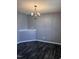 The dining room offers a dark wood floor and ample space for flexible arrangements at 3609 Cold Harbour Dr, Raleigh, NC 27610