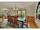 Charming dining room featuring natural light and elegant dining set for Gathering gatherings at 3622 Moonlight Dr, Chapel Hill, NC 27516
