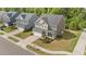 Aerial image of home showing manicured lawns and a welcoming front porch at 3700 Horton Hill Dr, New Hill, NC 27562