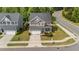 A beautiful aerial view of a home featuring a manicured lawn and a two-car garage at 3700 Horton Hill Dr, New Hill, NC 27562