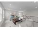 Bright living room features a neutral color palette, plush carpet, and a cozy seating area at 3700 Horton Hill Dr, New Hill, NC 27562